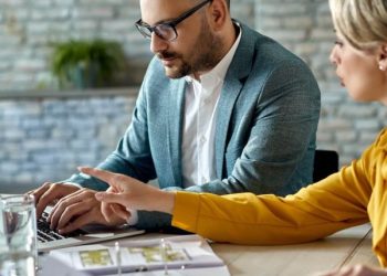 real-estate-agent-using-laptop-while-having-a-meeting-with-a-couple-in-the-office-1-1-py9wpqe7tkqs63lmm32qvy9sv8uyrhni89kprvfhi0 real-estate-agent-using-laptop-while-having-a-meeting-with-a-couple-in-the-office-1-1-py9wpqe7tkqs63lmm32qvy9sv8uyrhni89kprvfhi0